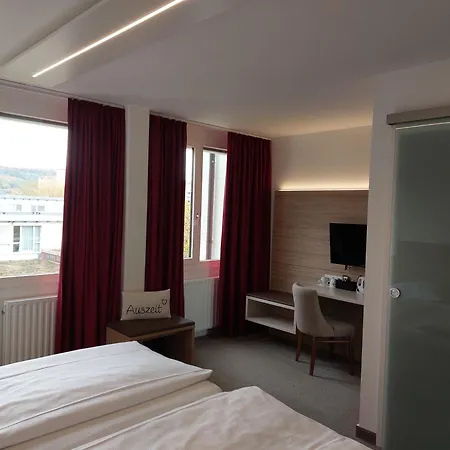 Отель Am Schlossberg 3*