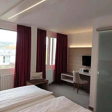 Отель Am Schlossberg Херренбург